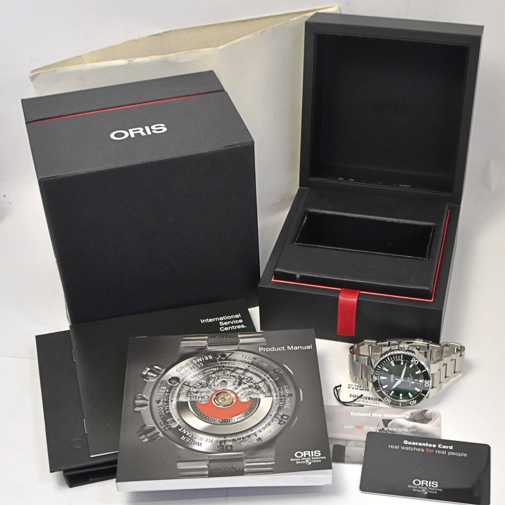 with paper ORIS Aquis Date 01 733 7730 4157-07 green Dial Automatic Men's
 Watch N#143394