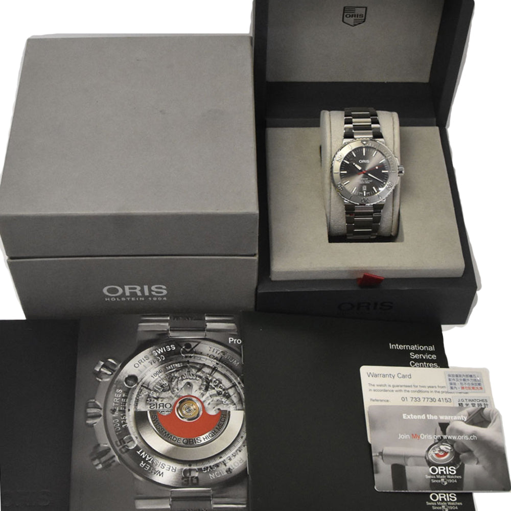 with paper ORIS Aquis Date Relief 01 733 7730 4153 gray Dial Automatic Men's
 Watch M#145563