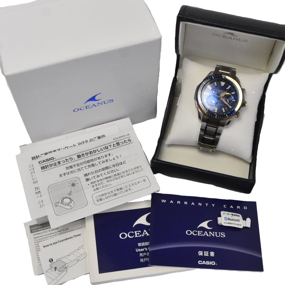 with paper CASIO Oceanus Cacharo OCW-P2000D-2AJF Titanium Authentic Divers Navy Dial Radio Sync Solar Men's
 Watch G#147433